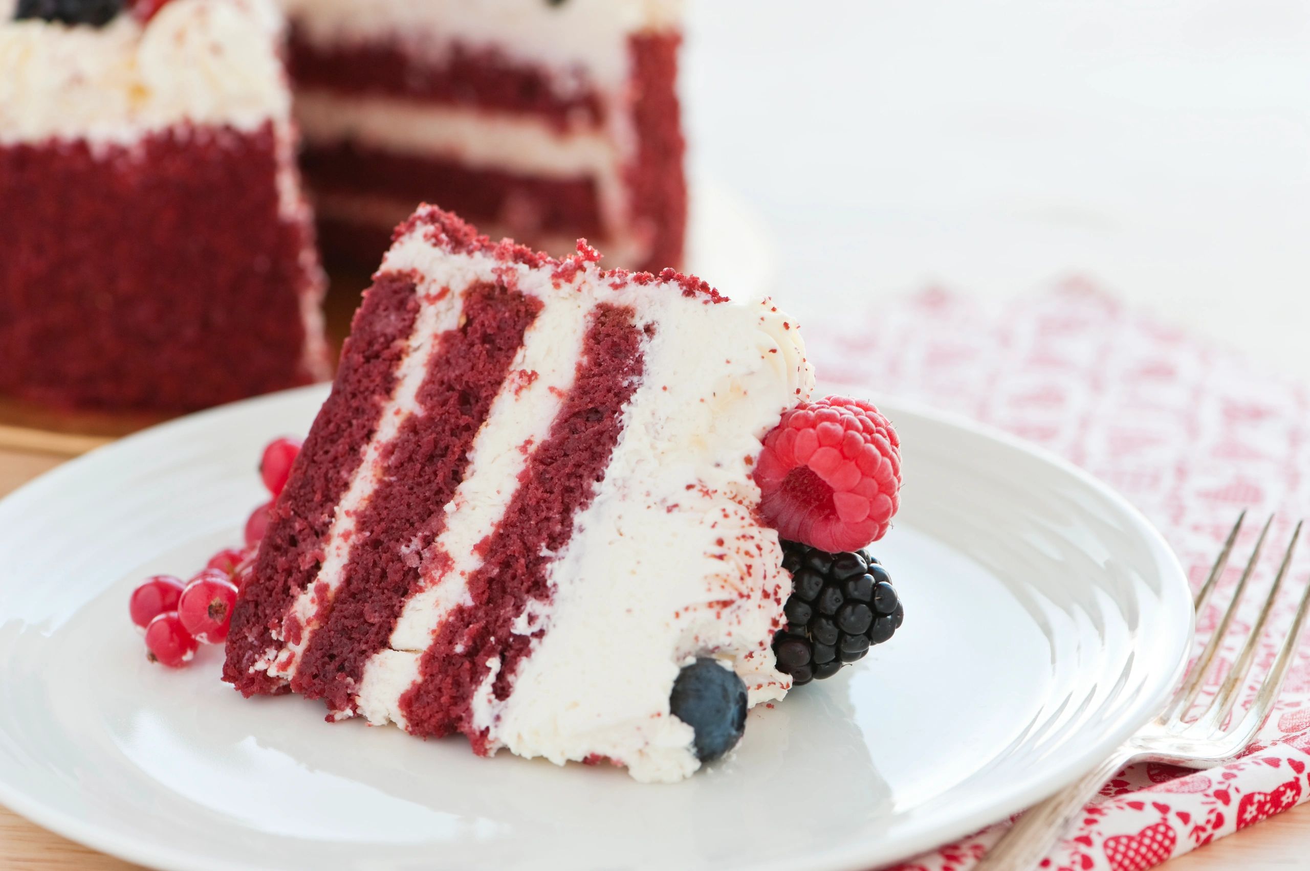 Slice of red velvet cake on a plate