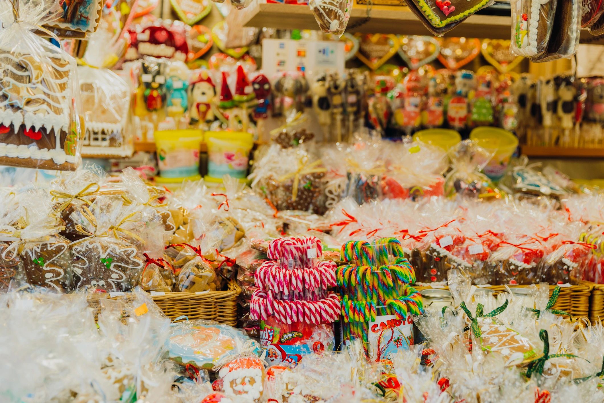 Assorted pastries and sweets displayed in a market-style case